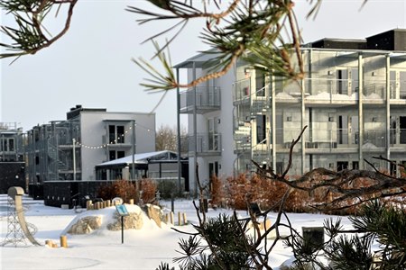 hotel facade and snow-covered miniature golf course