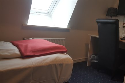 Economy Single Room Prinsen hotel. Photo.