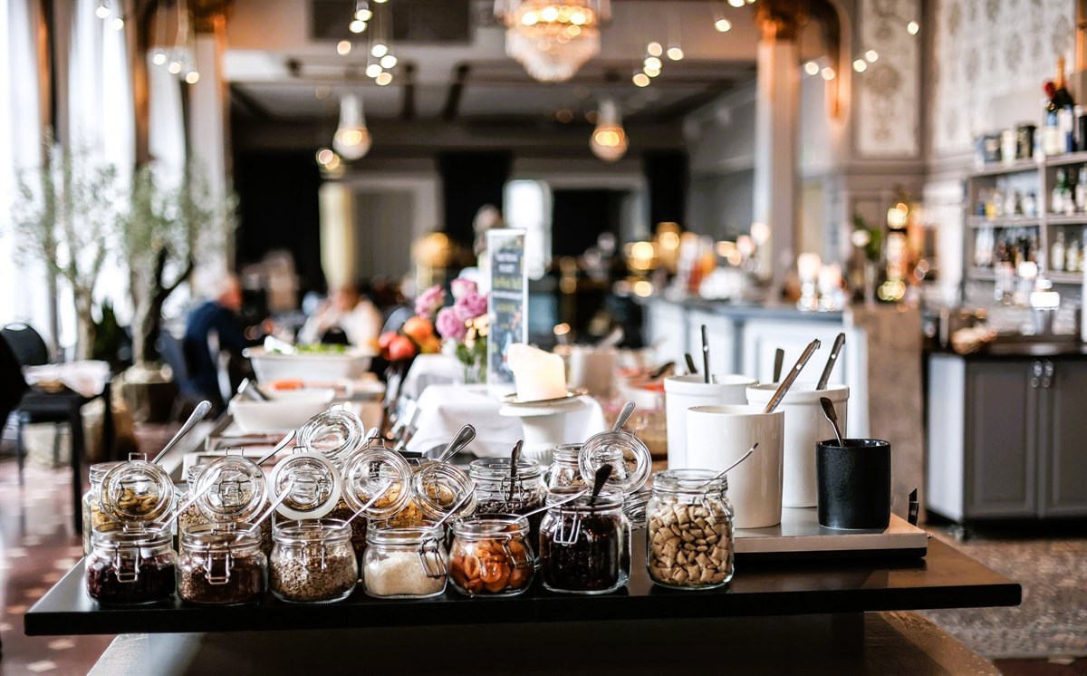 Prepared breakfast buffet in the dining room.