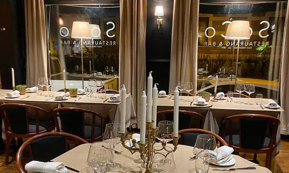 Soco beautiful table setting dinner at restaurant. Photo.