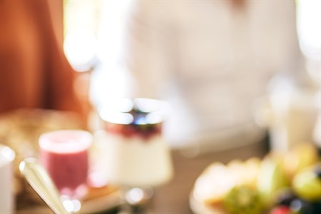 Enjoy breakfast with your friend. Photo.