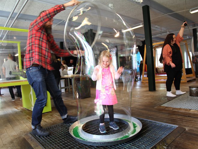 a child in a soap bubble