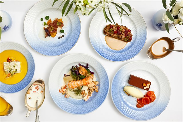 Several plates with food. Image.