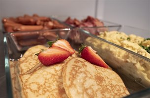 Pancakes at the breakfast buffet. Image.
