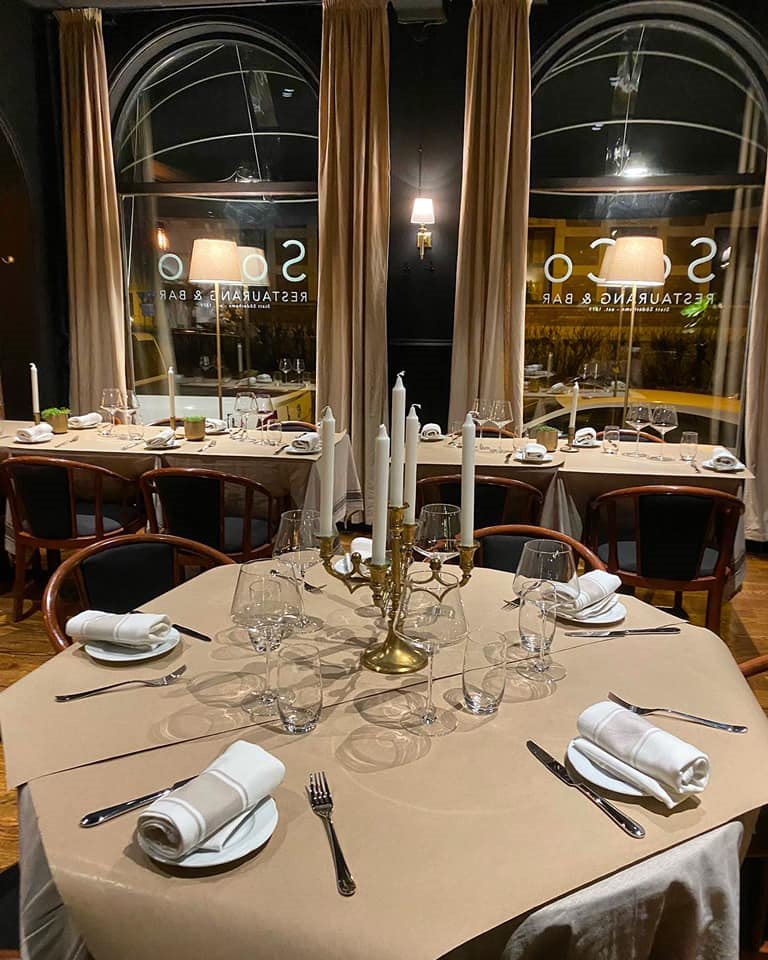 Soco beautiful table setting dinner at restaurant. Photo.