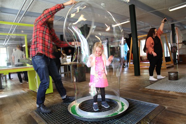 a child in a soap bubble