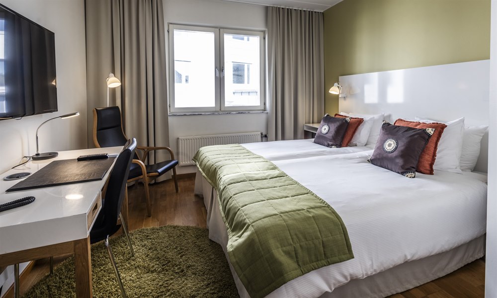 Klassiskt dubbelrum. Foto.