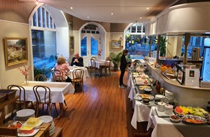 Enjoy delicious breakfast at hotel. Photo.