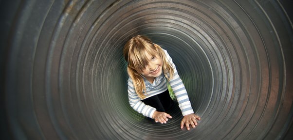a child inside a tunnel