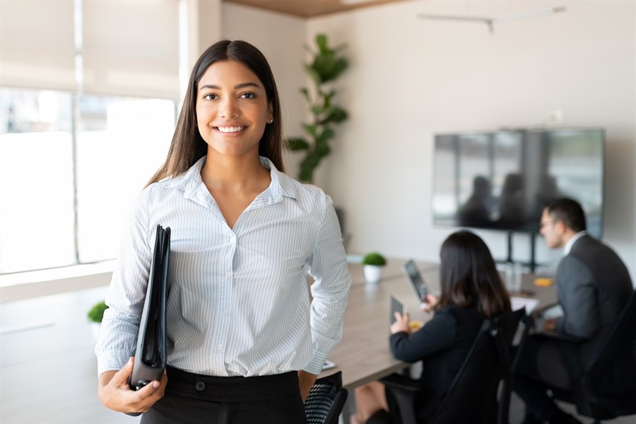 woman smiling at meeting