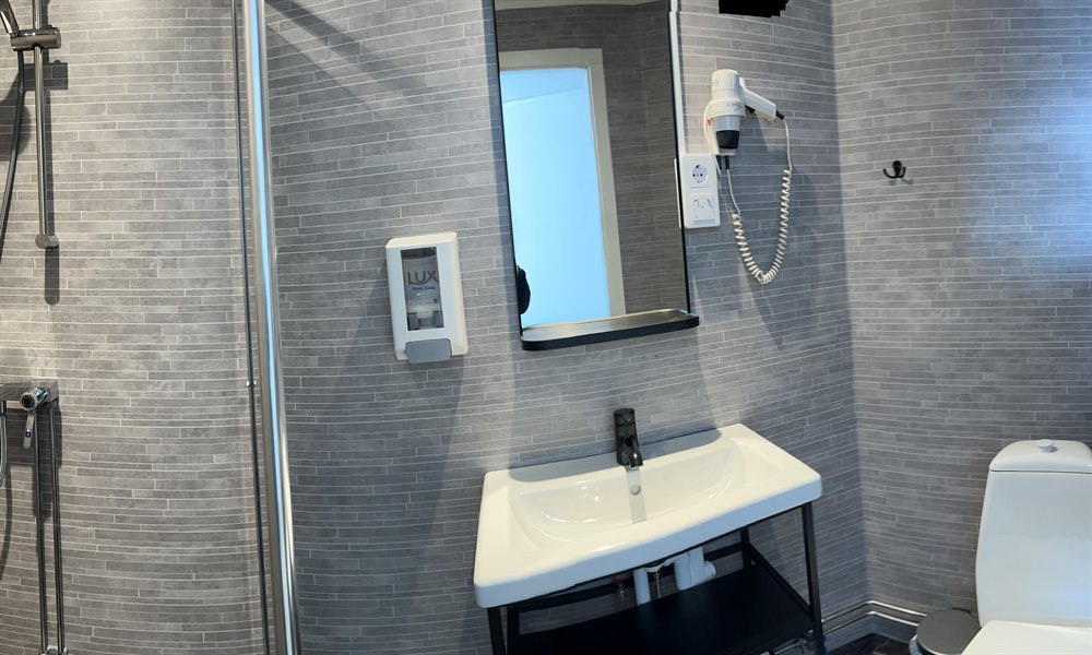 Baderomshotell E10 Kiruna. Bilde.