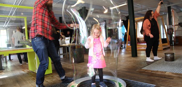 a child in a soap bubble
