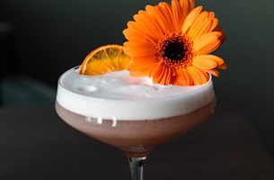 a drink with a flower