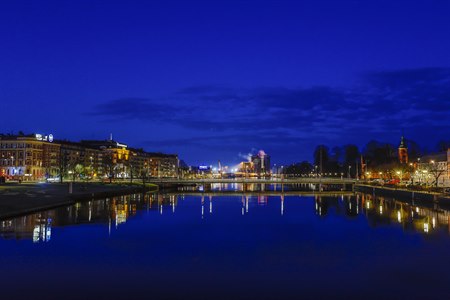 The river Nissan in Halmstad by night. Image.